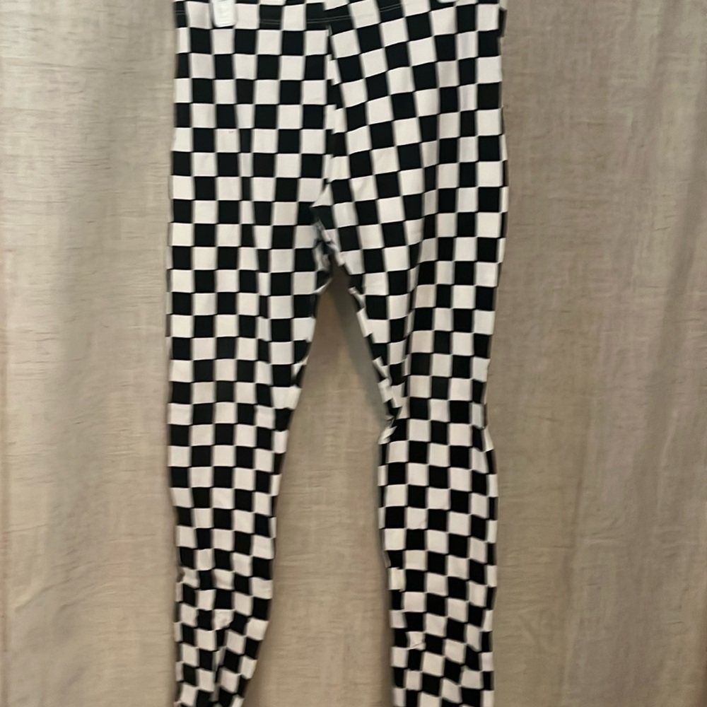 Girls XL checkered leggings.